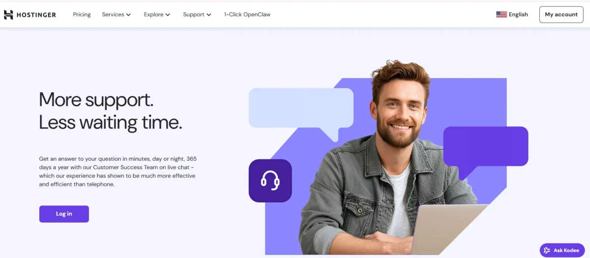 Smiling man using a laptop with speech bubbles in the background, representing Hostinger’s 24/7 live chat customer support.